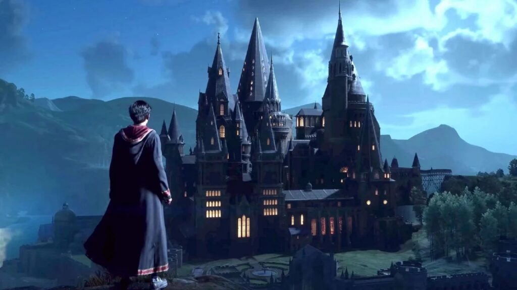 Il protagonista di Hogwarts Legacy che ammira il castello sullo sfondo