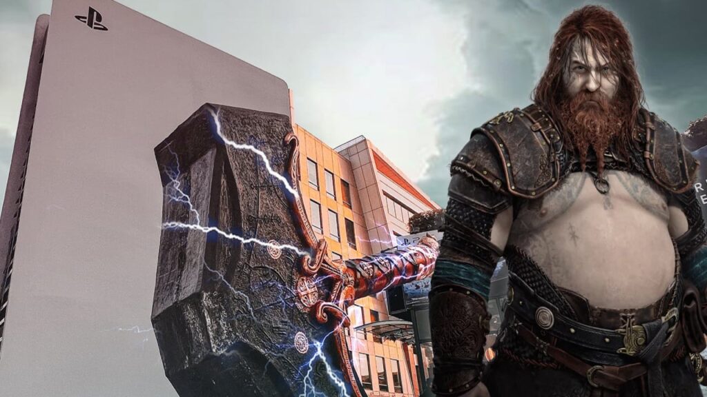 Una PS5 gigante con affianco il martello di Thor