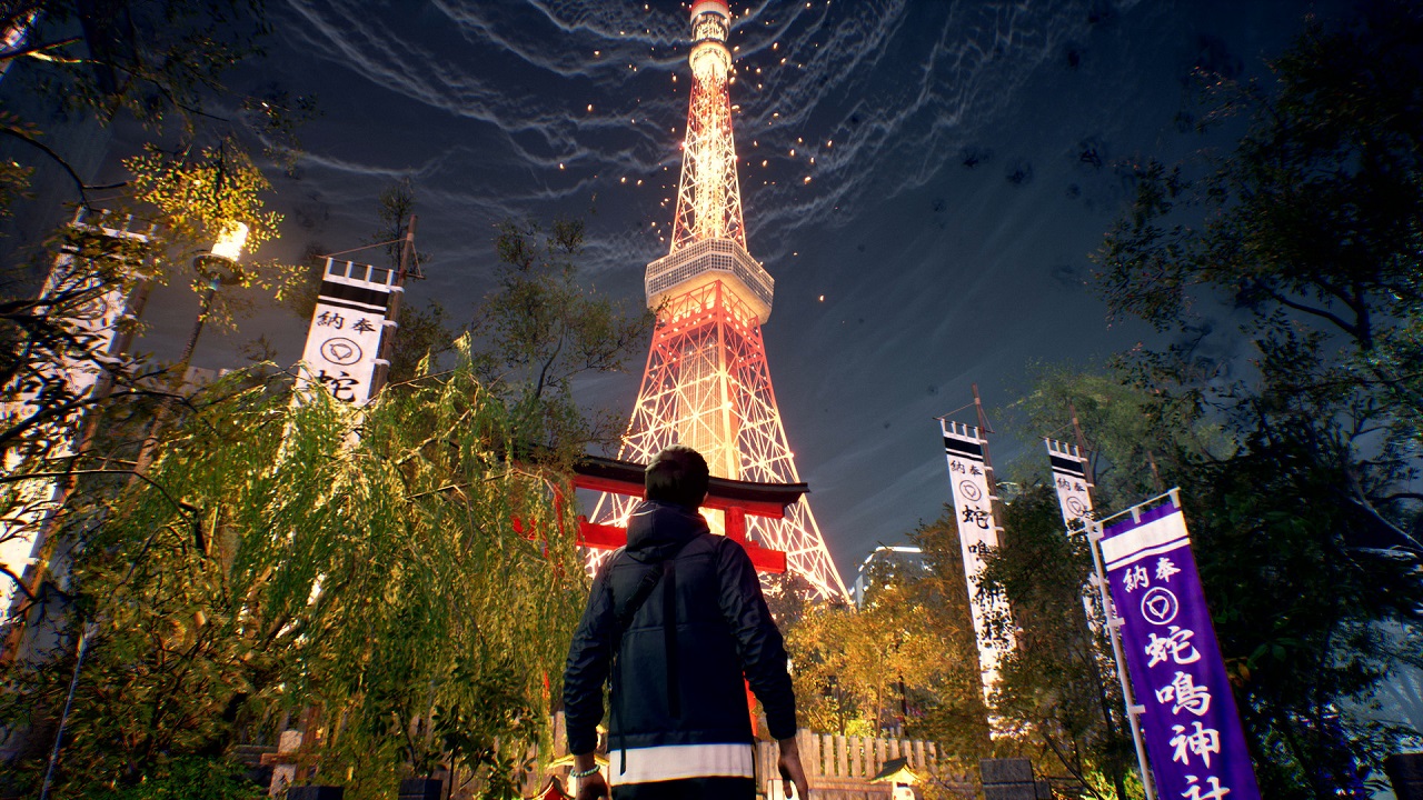Akita osserva, visto di spalle, la Tokyo Tower