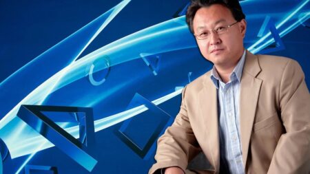 PlayStation, Shuhei Yoshida crede che la creatività sia più importante delle IA Shuhei Yoshida con i loghi di PlayStation solo sfondo