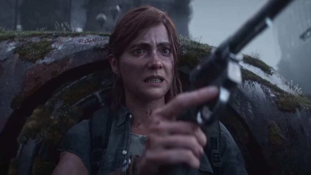 Ellie di The Last of Us Parte 2 mentre impugna una pistola e con uno sguardo arrabbiato