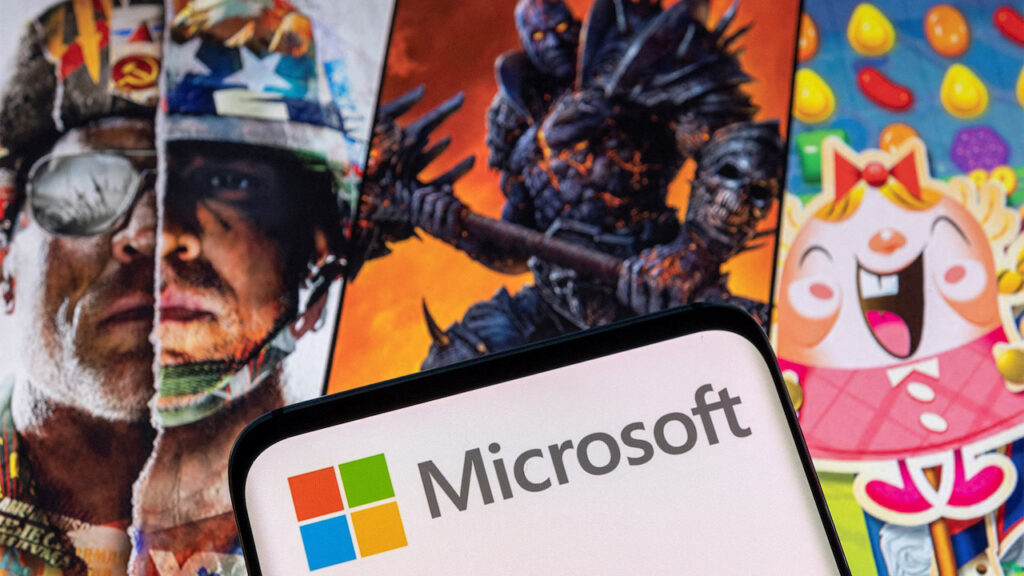 Il logo di Microsoft con sullo sfondo alcuni giochi di Activision Blizzard