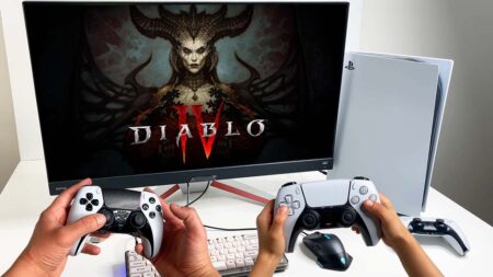 Una PS5 in verticale con un monitor con Diablo 4