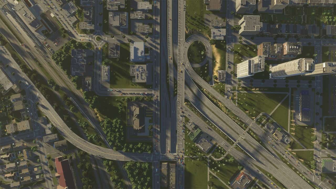 Vista perpendicolare dall'alto di uno svincolo autostradale in Cities Skylines 2