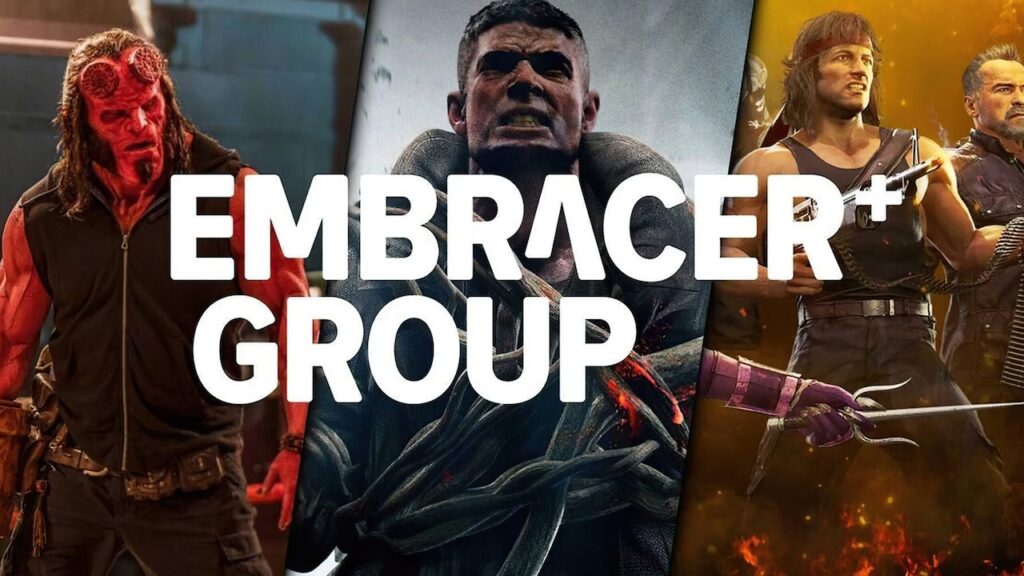 Il logo di Embracer Group con dietro dei giochi