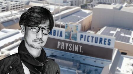 Hideo Kojima con sullo sfondo Columbia Pictures con il logo di Physint