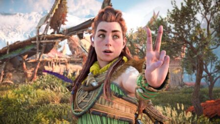 Aloy di Horizon Forbidden West mentre fa il due con le dita