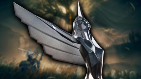 La statuetta dei The Game Awards 2024 con dietro Elden Ring: Shadow of the Erdtree