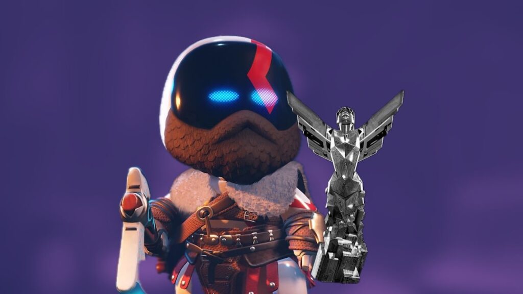 Astro Bot in versione Kratos con una statuetta del GOTY in mano