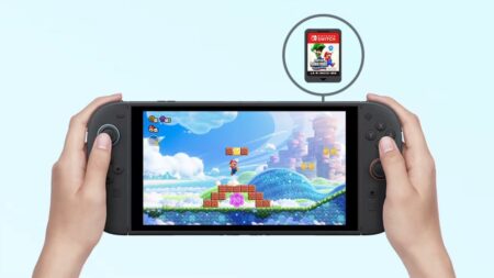 Un Nintendo Switch 2 con una scheda per Nintendo Switch 1