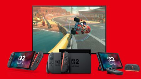 Tre Nintendo Switch 2 con dietro un TV con Mario Kart World