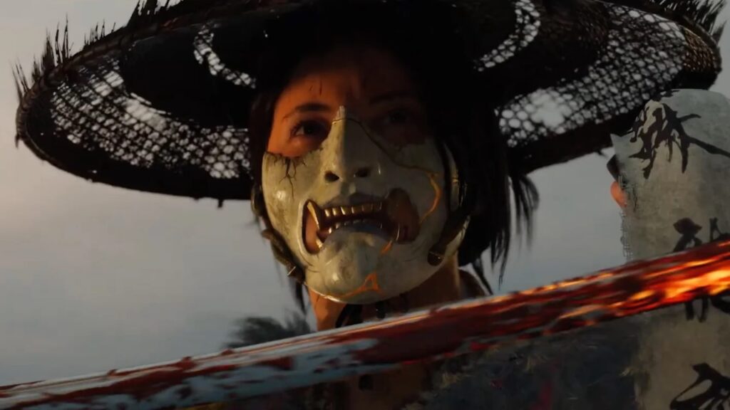 Asu di Ghost of Yotei mentre pulisce la sua katana sul nome di uno Yotei