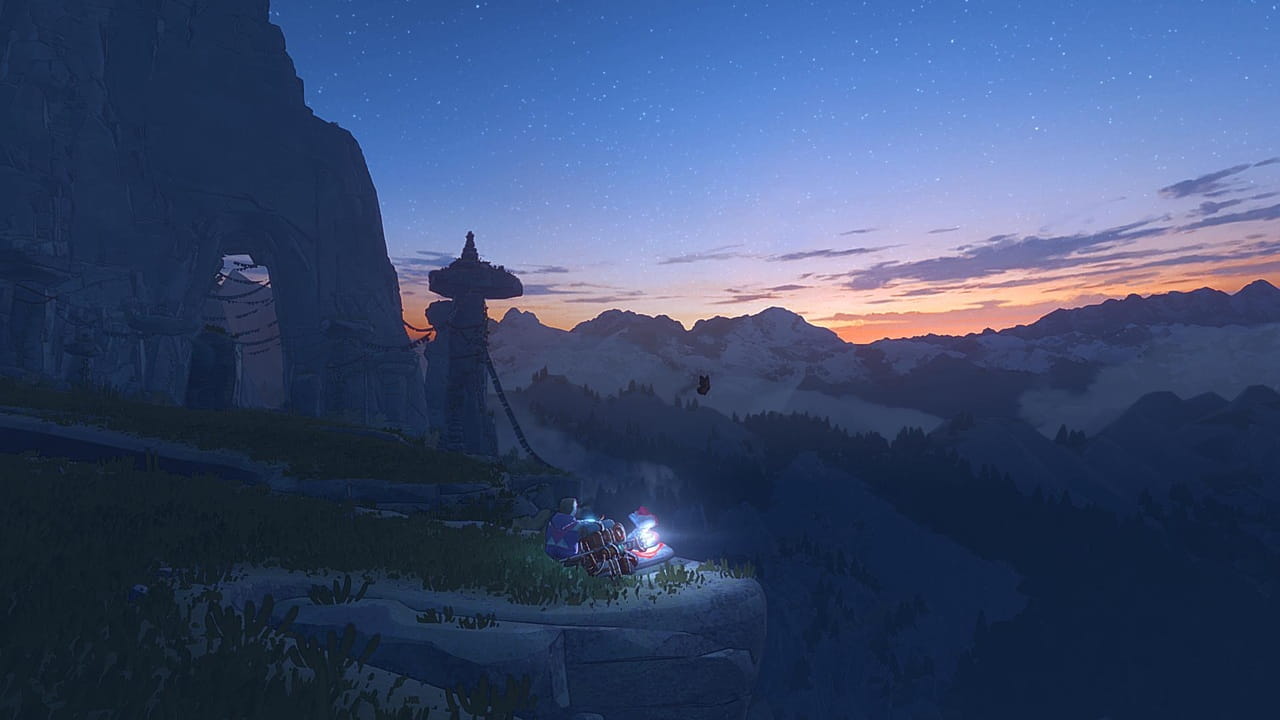 L'alpinista Aava in Cairn si rilassa al tramonto sul bordo di una montagna