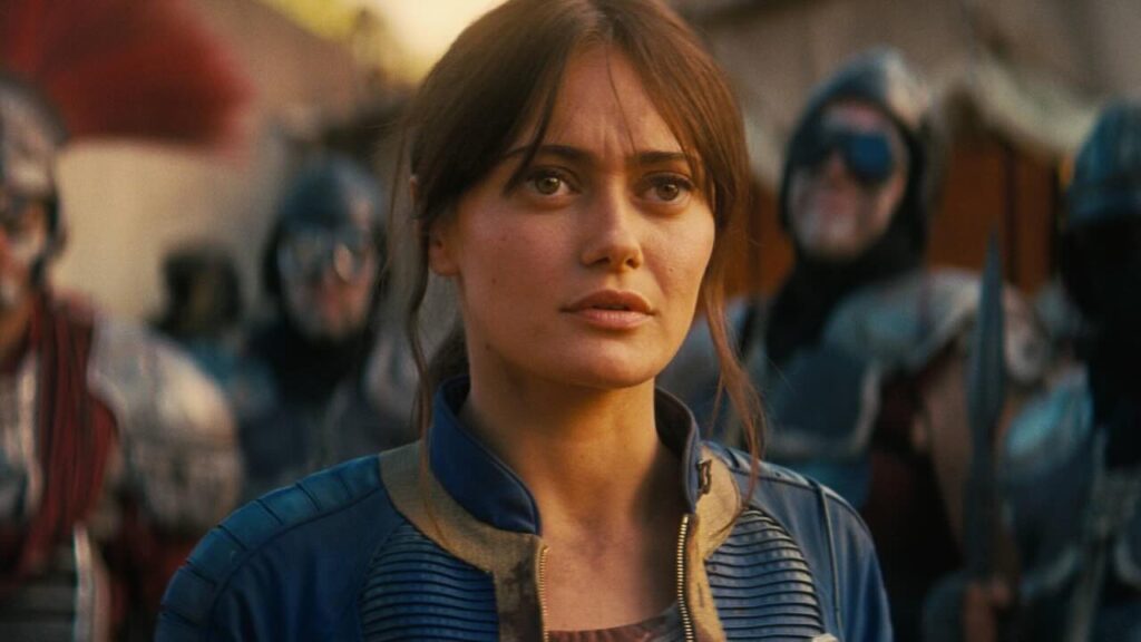 Lucy della stagione 2 di Fallout con un'espressione perplessa