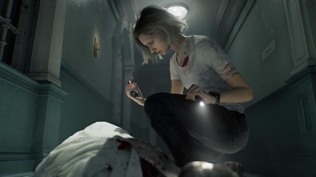 Grace di Resident Evil Requiem con una torcia in mano in un corridoio