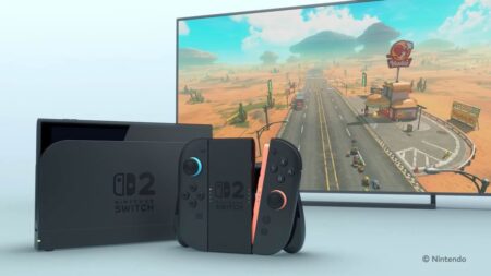 Un Nintendo Switch 2 con dietro un TV con Mario Kart World